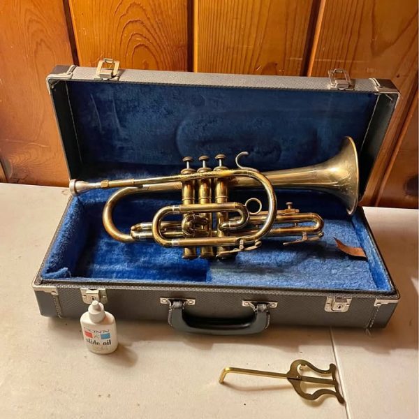 Old ambassador Cornett vintage musical instrument