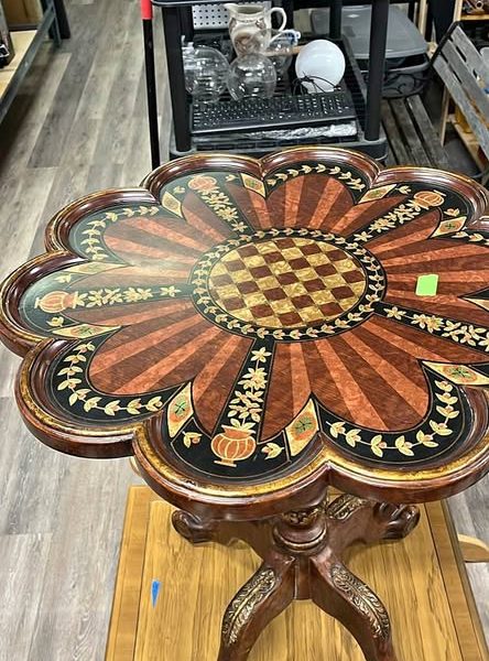 Tilting antique table