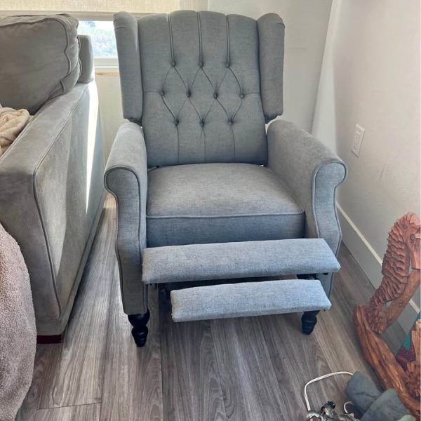 Grey Wing Back Chair with Footrest that folds in